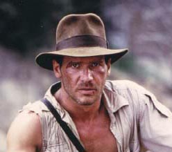 Hat, torn shirt, rugged countenance, staring into the middle distance; it's a movie archaeologist, alright!